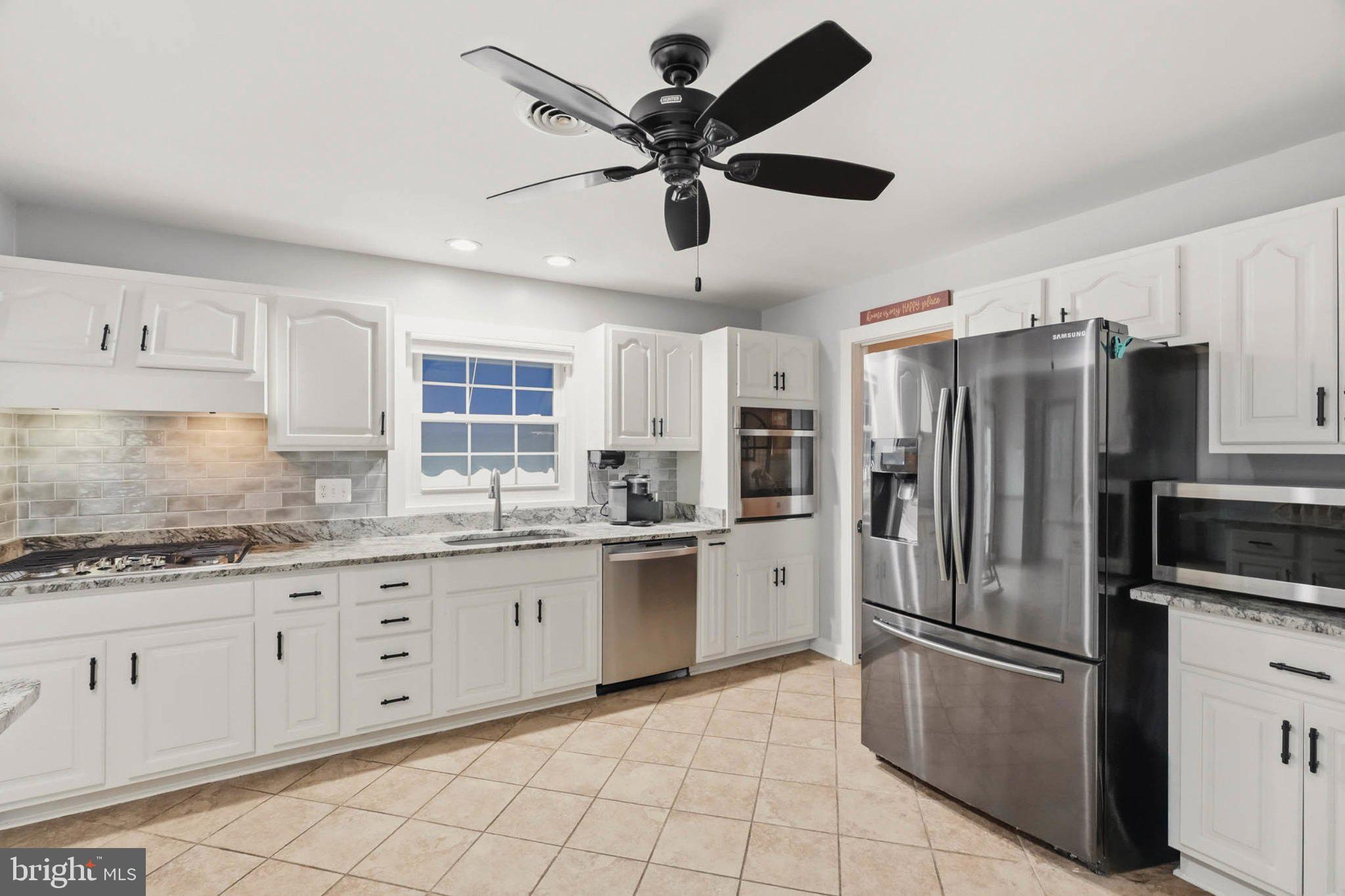 3202 North Chatham Road Ellicott City, MD 21042 - Photo 11 of 62 Modern kitchen with sleek finishes