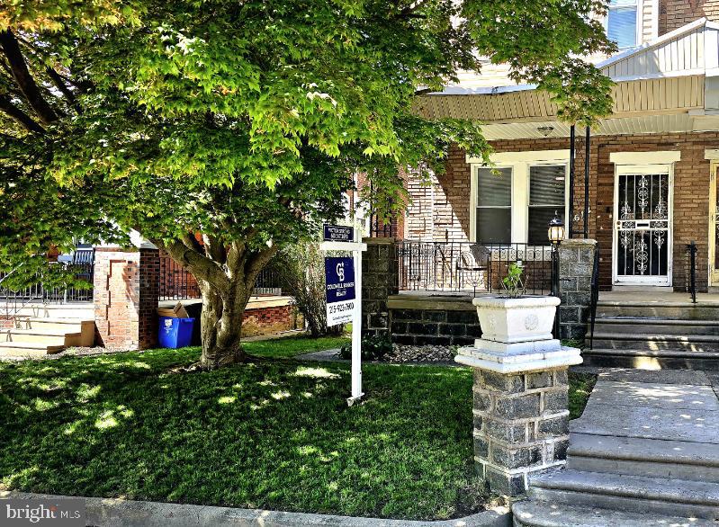 614 Wynnewood Road Philadelphia, PA 19151 - Photo 2 of 15 a front view of a house with garden