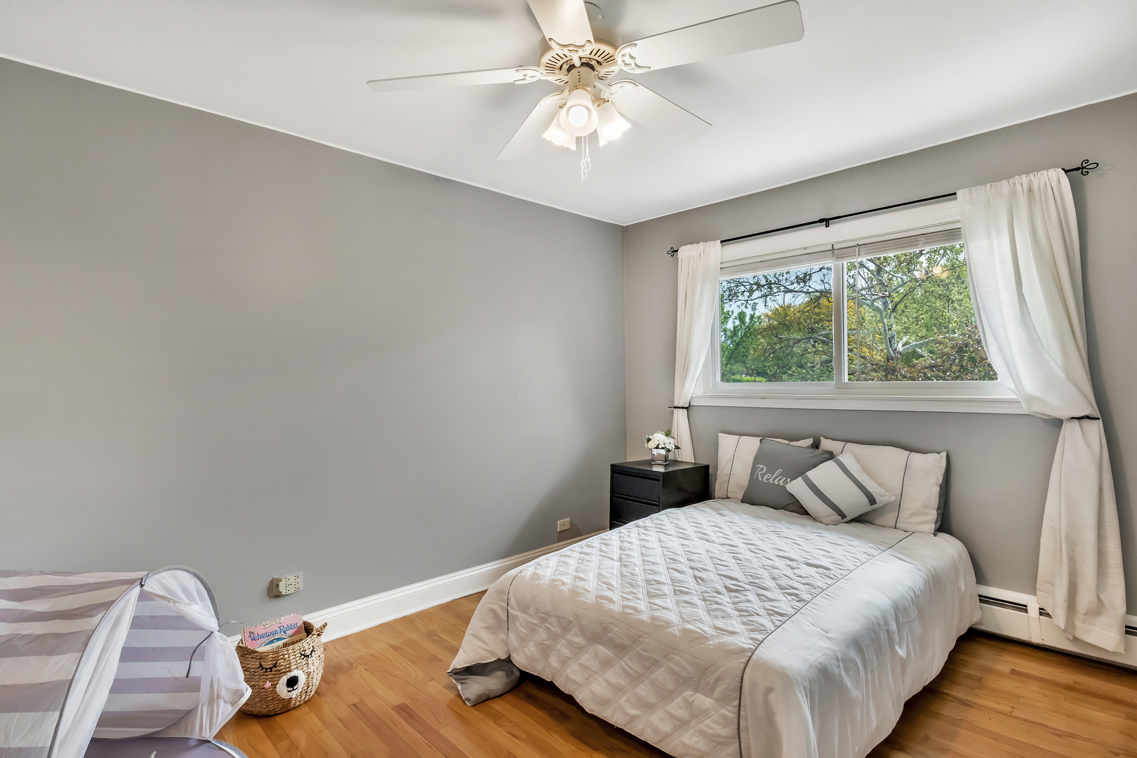 1341 Greenwillow Lane, Unit A Glenview, IL 60025 - Photo 18 of 27 a bedroom with a bed and window