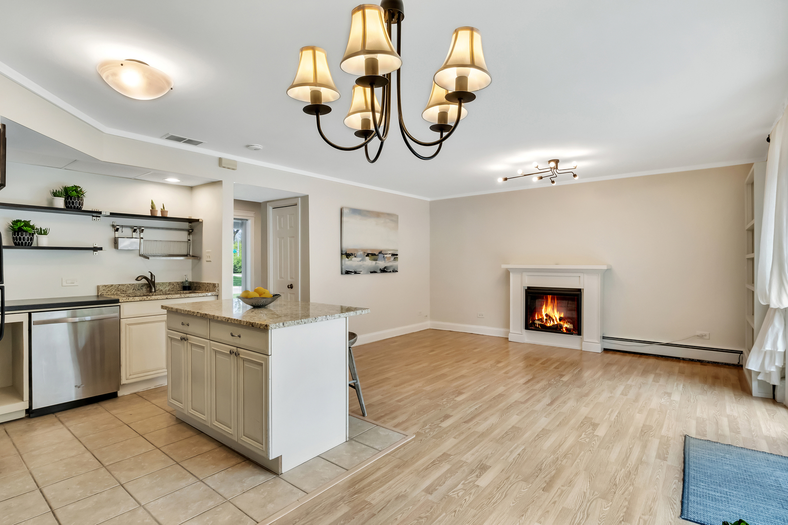 1341 Greenwillow Lane, Unit A Glenview, IL 60025 - Photo 5 of 27 a kitchen with cabinets and wooden floor
