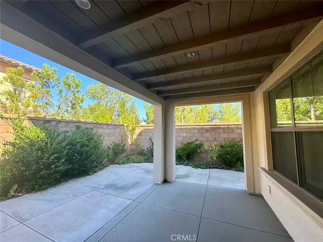 a view of a room with garden and patio