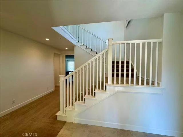 a view of entryway with stairs