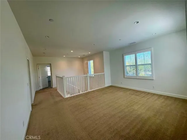 a view of a livingroom with a staircase