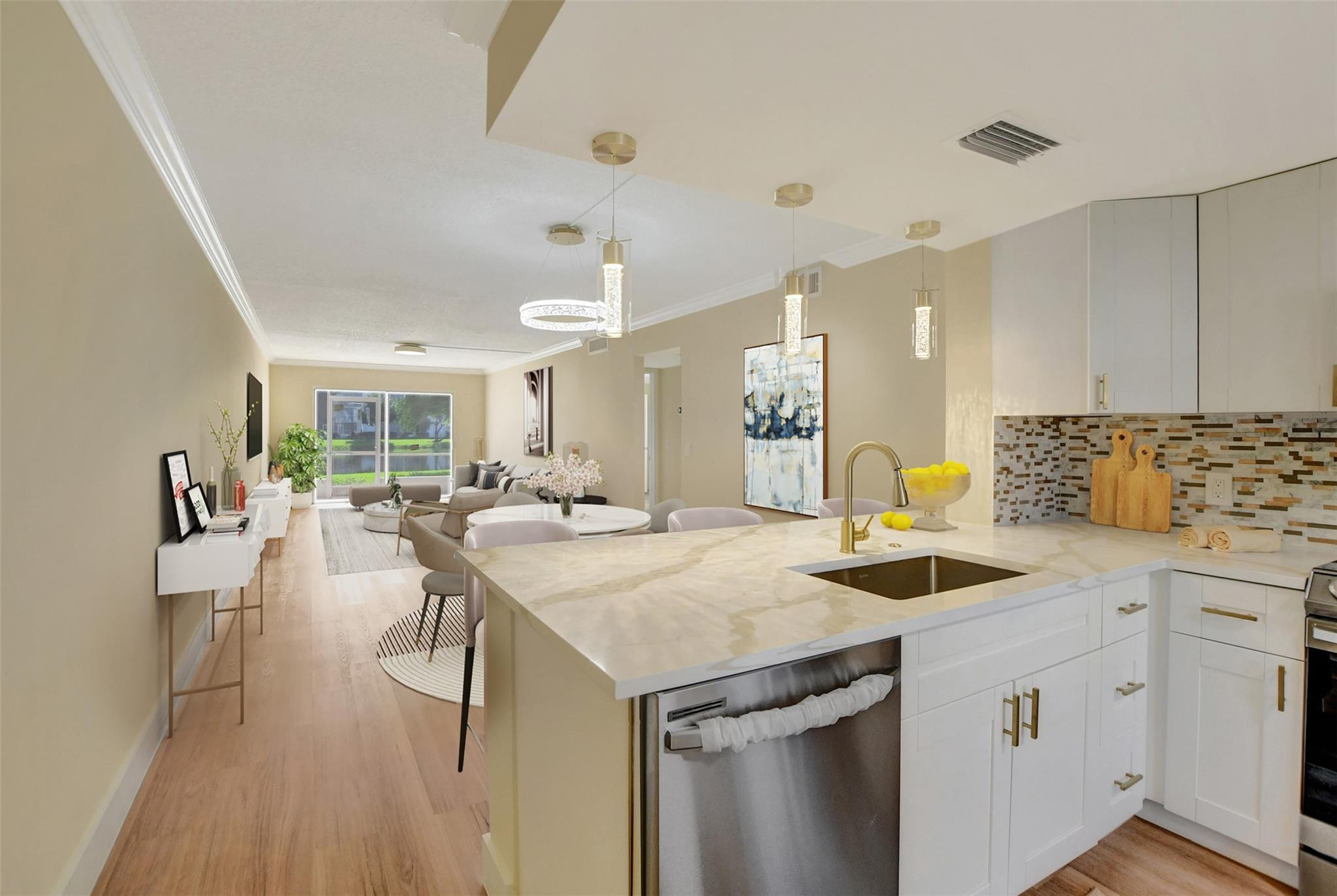 1019 Guildford East, Unit 1019 Boca Raton, FL 33434 - Photo 14 of 38 a kitchen with sink stove and white cabinets