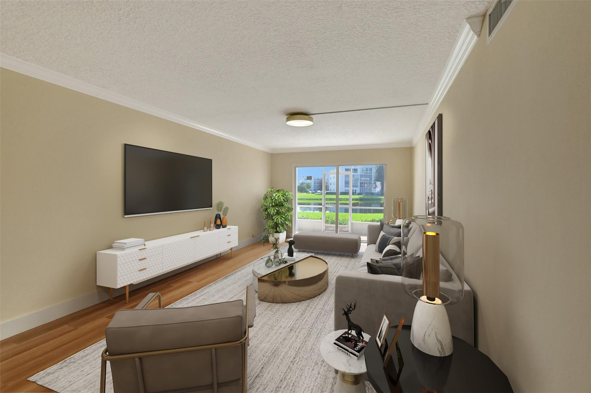 1019 Guildford East, Unit 1019 Boca Raton, FL 33434 - Photo 19 of 38 a living room with furniture and a flat screen tv