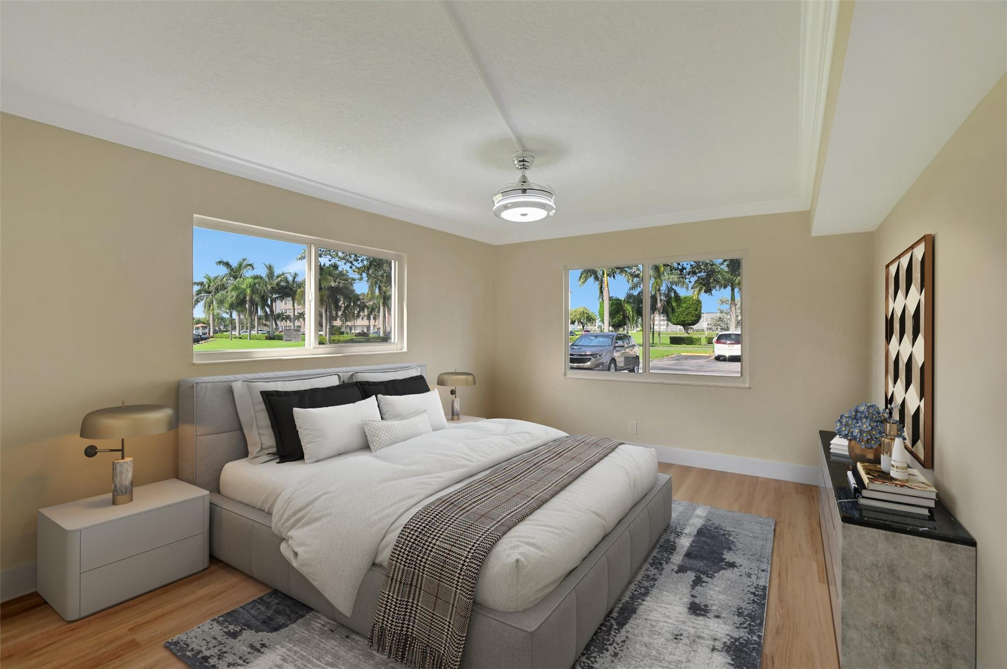 1019 Guildford East, Unit 1019 Boca Raton, FL 33434 - Photo 23 of 38 a bedroom with a bed and a couch