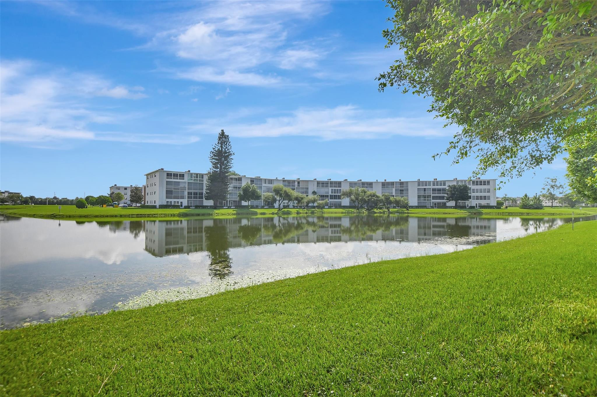 1019 Guildford East, Unit 1019 Boca Raton, FL 33434 - Photo 38 of 38 a view of a lake with a city view