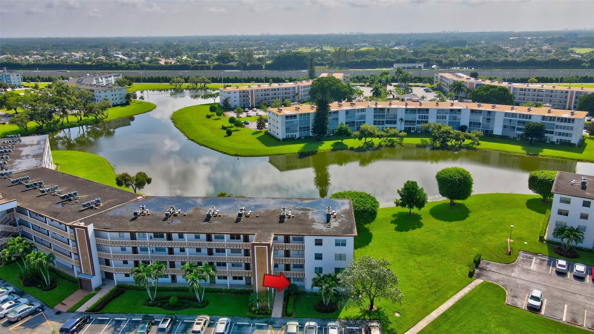 1019 Guildford East, Unit 1019 Boca Raton, FL 33434 - Photo 4 of 38 a view of a city