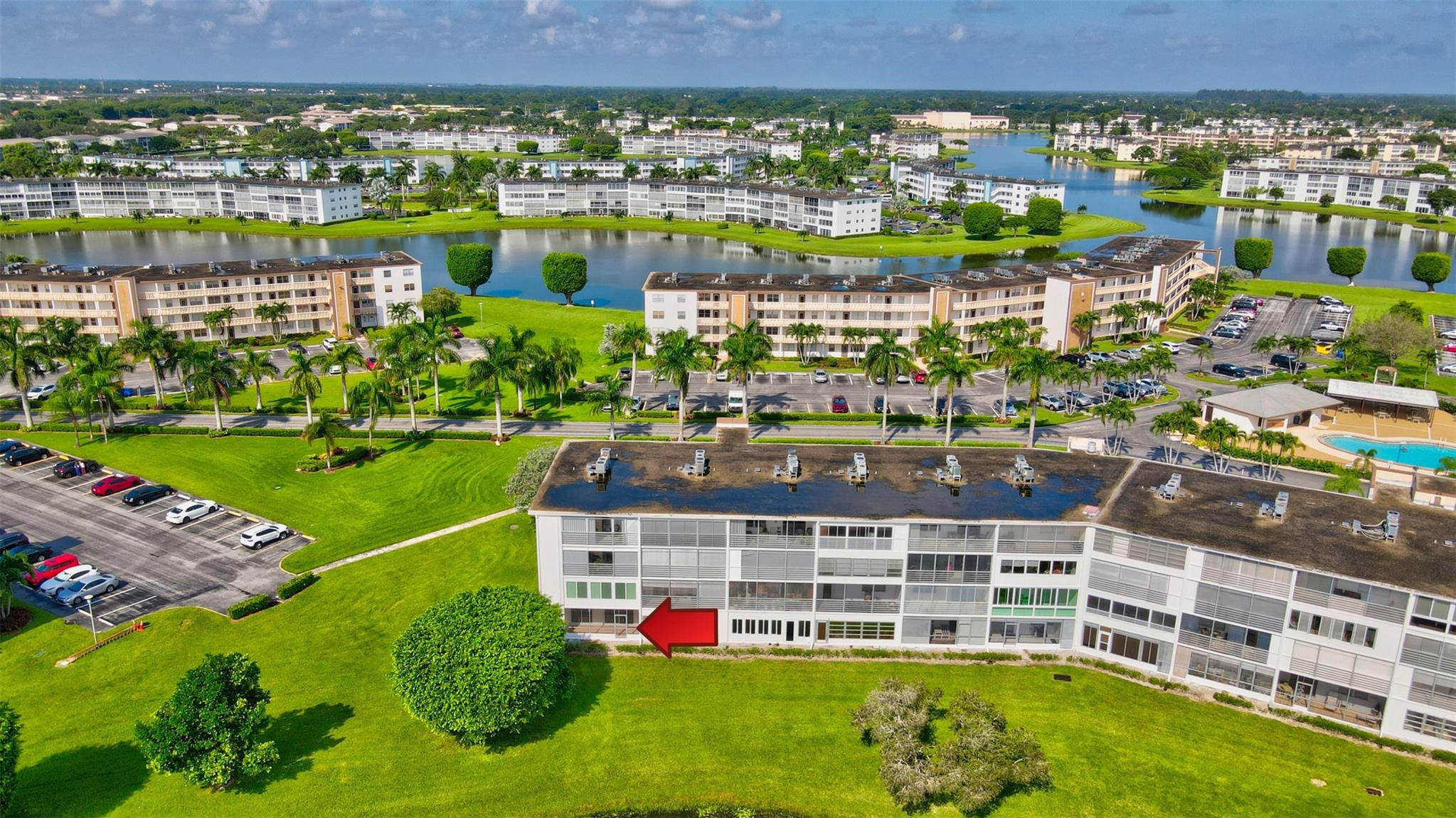 1019 Guildford East, Unit 1019 Boca Raton, FL 33434 - Photo 9 of 38 a view of a city with tall buildings