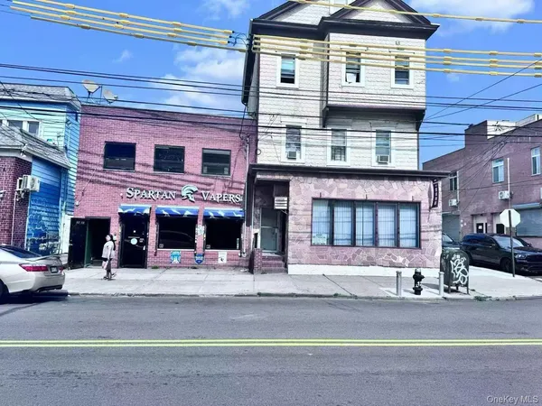 a view of a building with a parking space