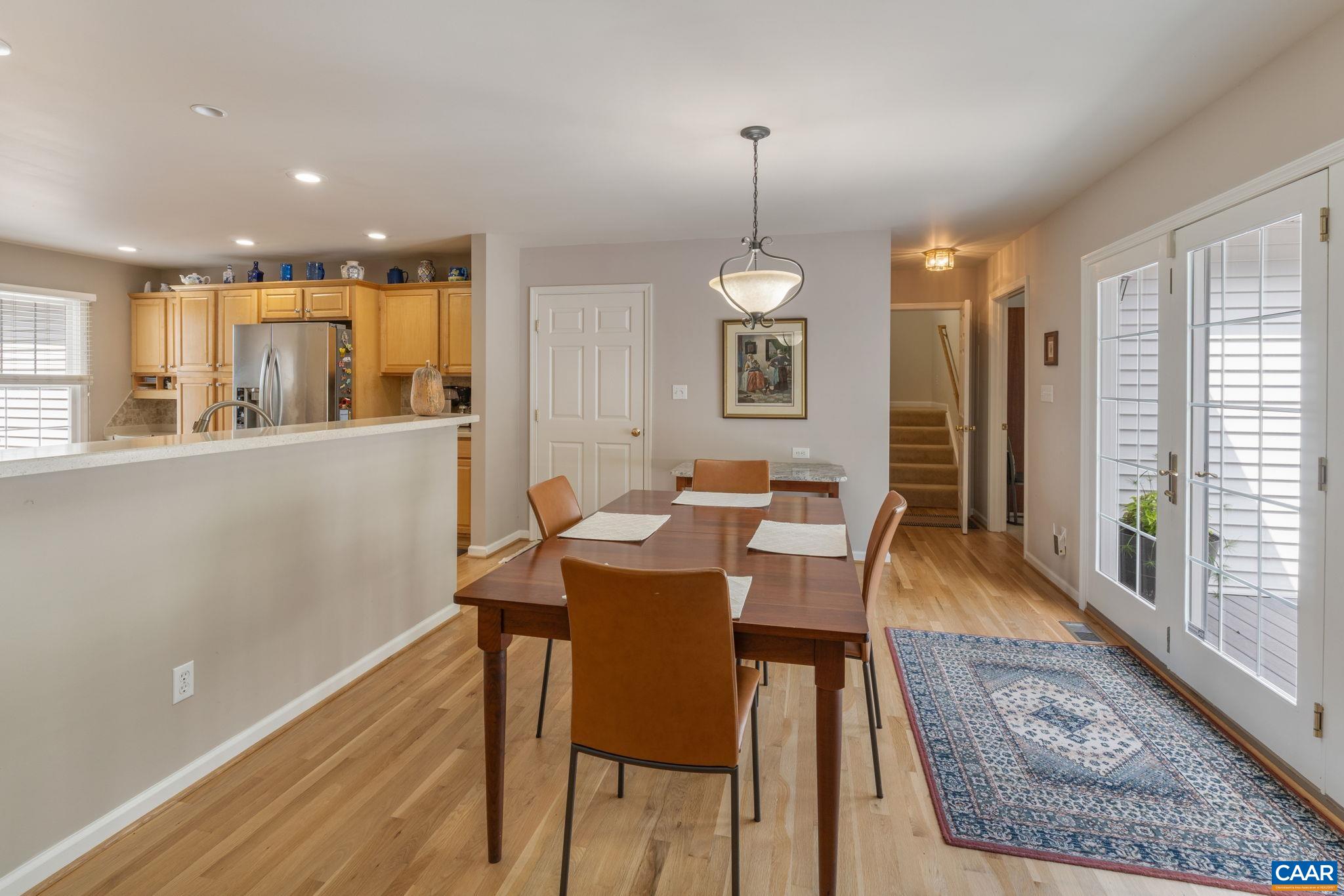 1900 Fray Road Advance Mills, VA 22968 - Photo 21 of 59 a view of a dining room with furniture and wooden floor