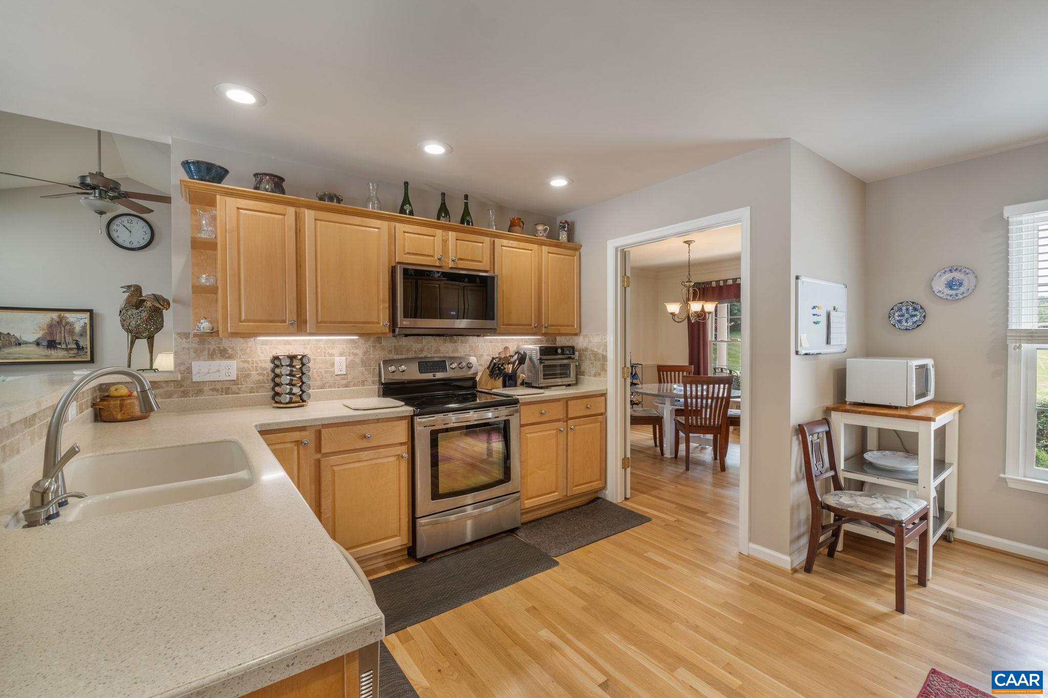 1900 Fray Road Advance Mills, VA 22968 - Photo 25 of 59 a kitchen with granite countertop a sink appliances cabinets and counter space