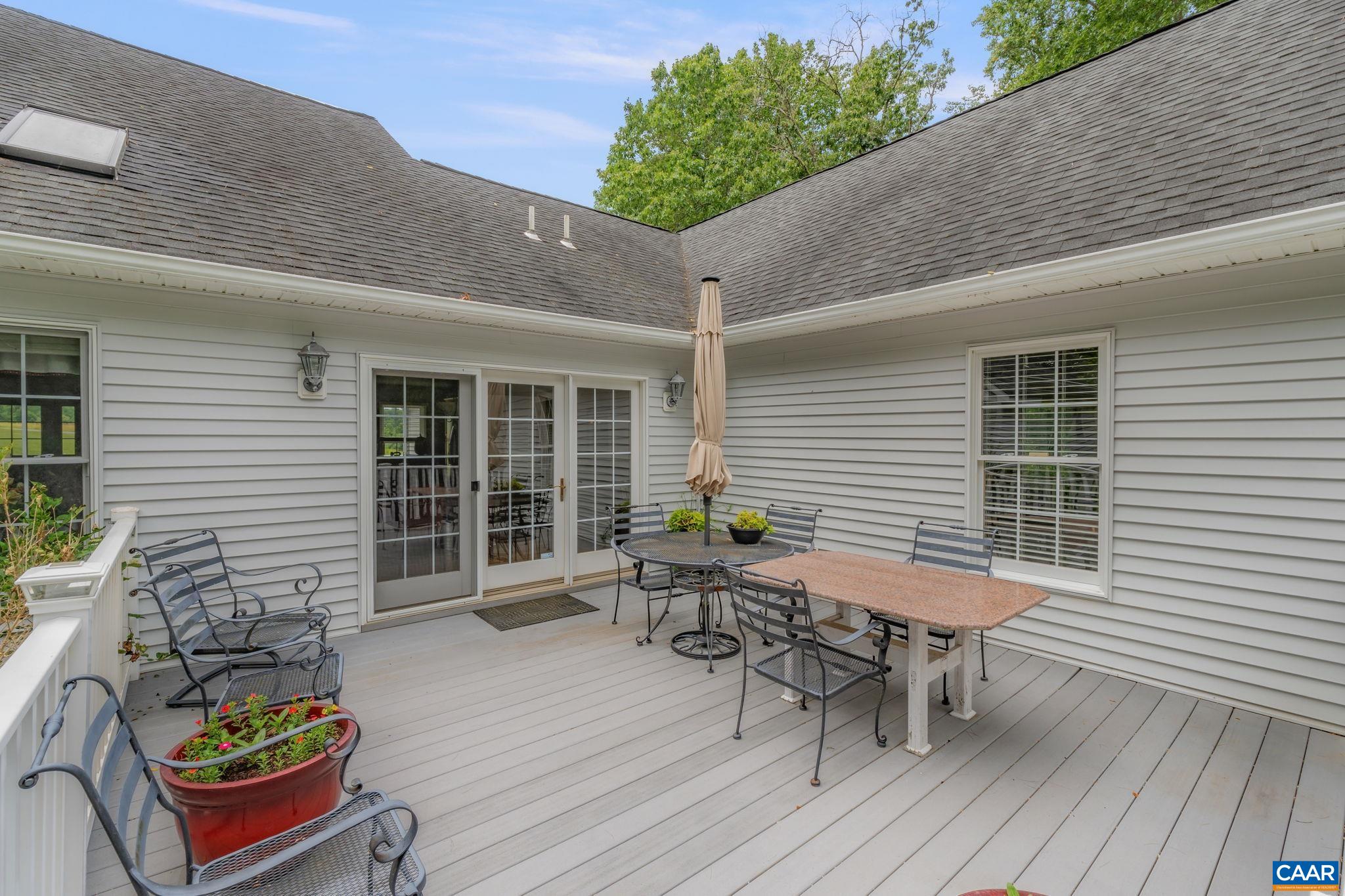 1900 Fray Road Advance Mills, VA 22968 - Photo 33 of 59 a backyard of a house with seating space