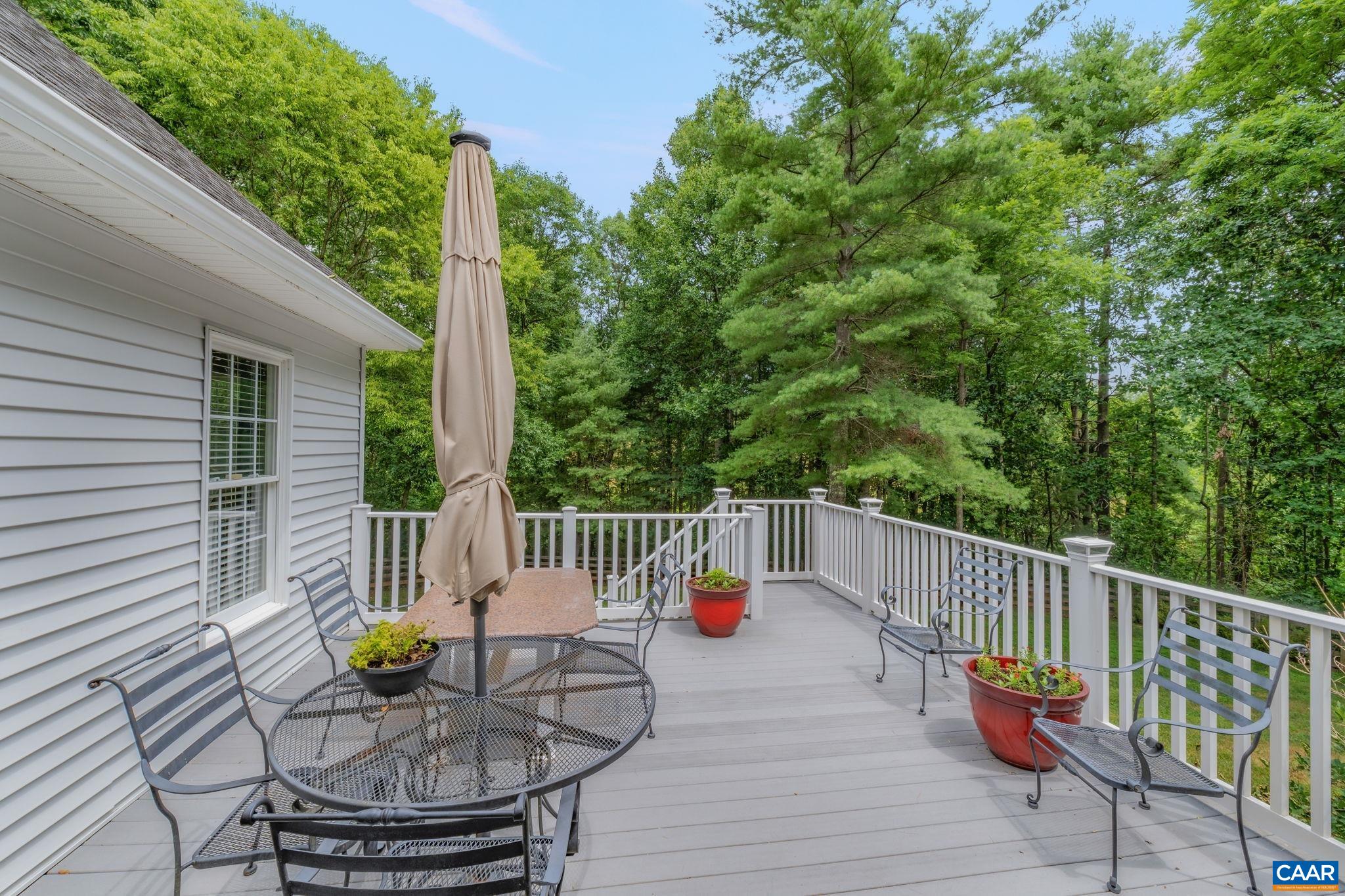1900 Fray Road Advance Mills, VA 22968 - Photo 34 of 59 a view of balcony with chairs and wooden fence
