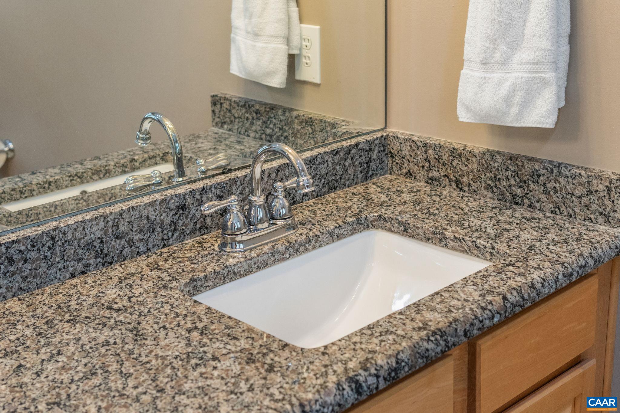 1900 Fray Road Advance Mills, VA 22968 - Photo 42 of 59 a bathroom with a granite countertop sink and a mirror