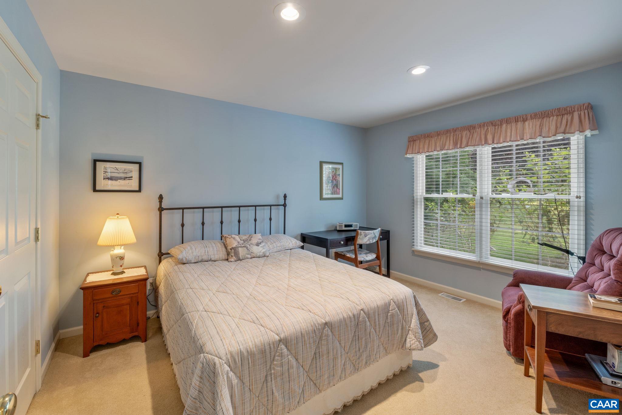 1900 Fray Road Advance Mills, VA 22968 - Photo 44 of 59 a bedroom with a bed and a large window