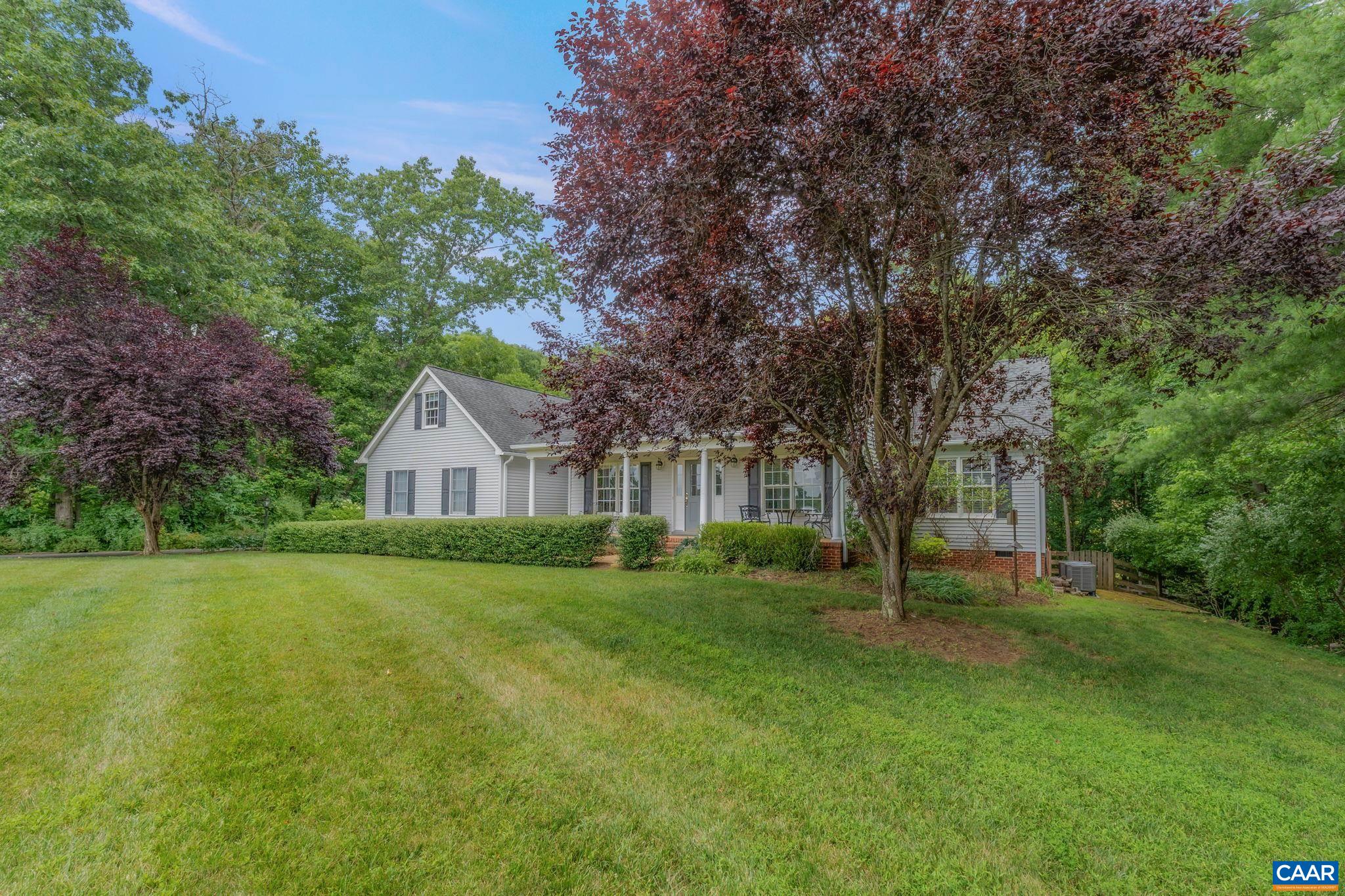 1900 Fray Road Advance Mills, VA 22968 - Photo 6 of 59 a view of a large garden with plants and large trees
