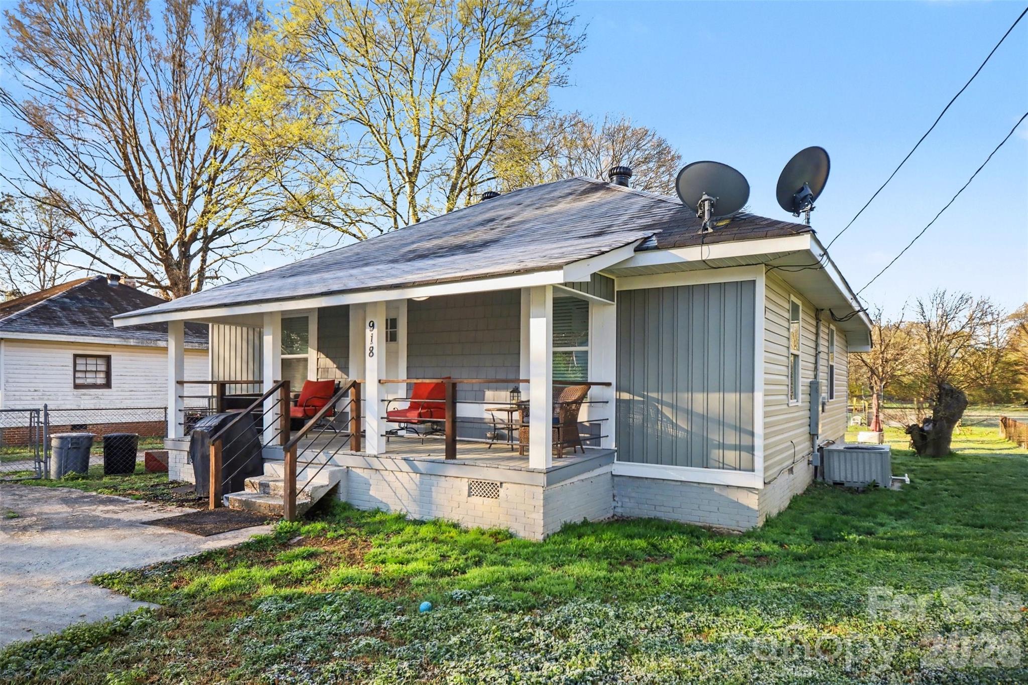 918 8th Street Lancaster, SC 29720 - Photo 12 of 32 a front view of house with yard and trees in the background