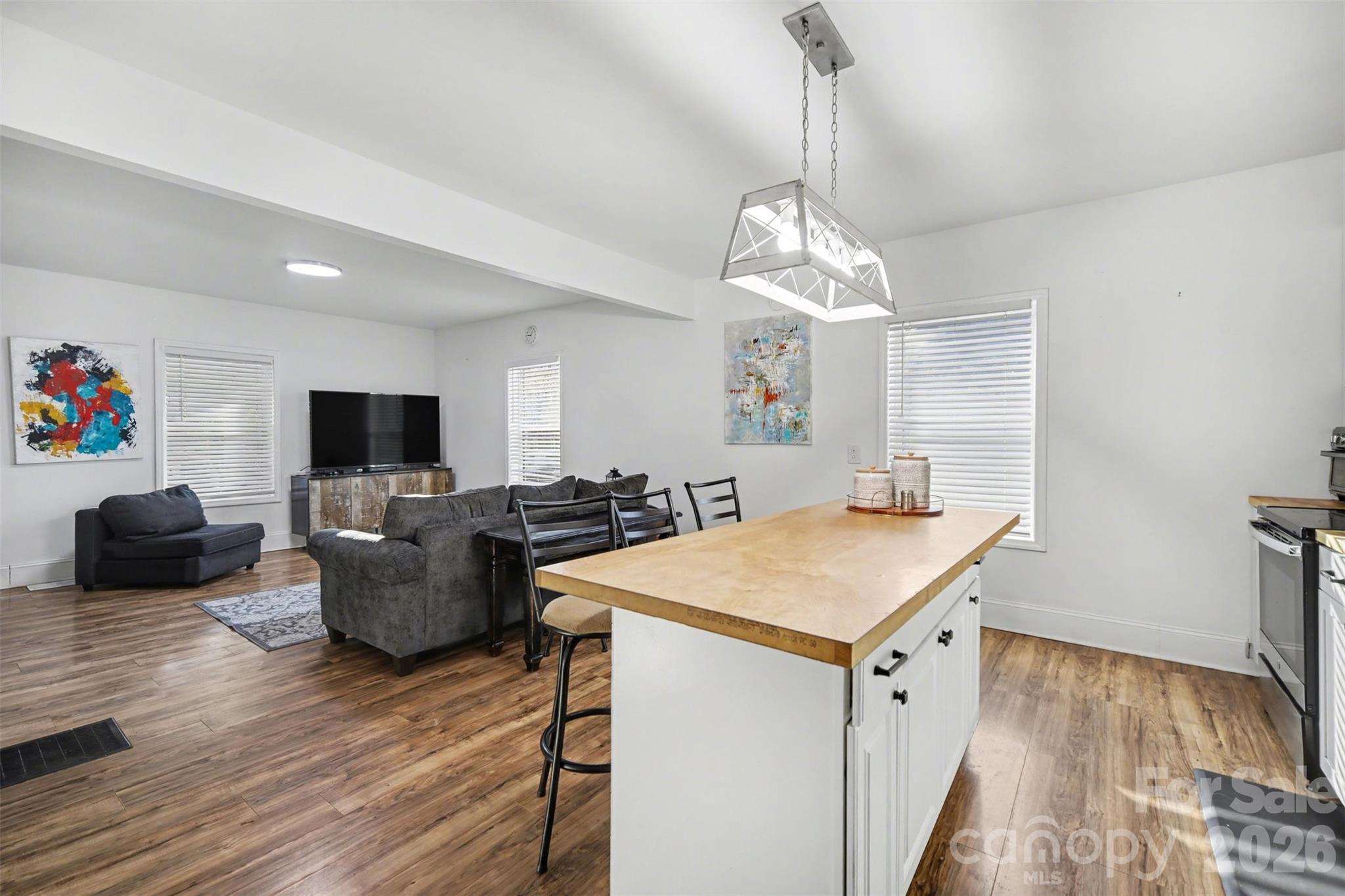 918 8th Street Lancaster, SC 29720 - Photo 19 of 32 a room with furniture and a flat screen tv
