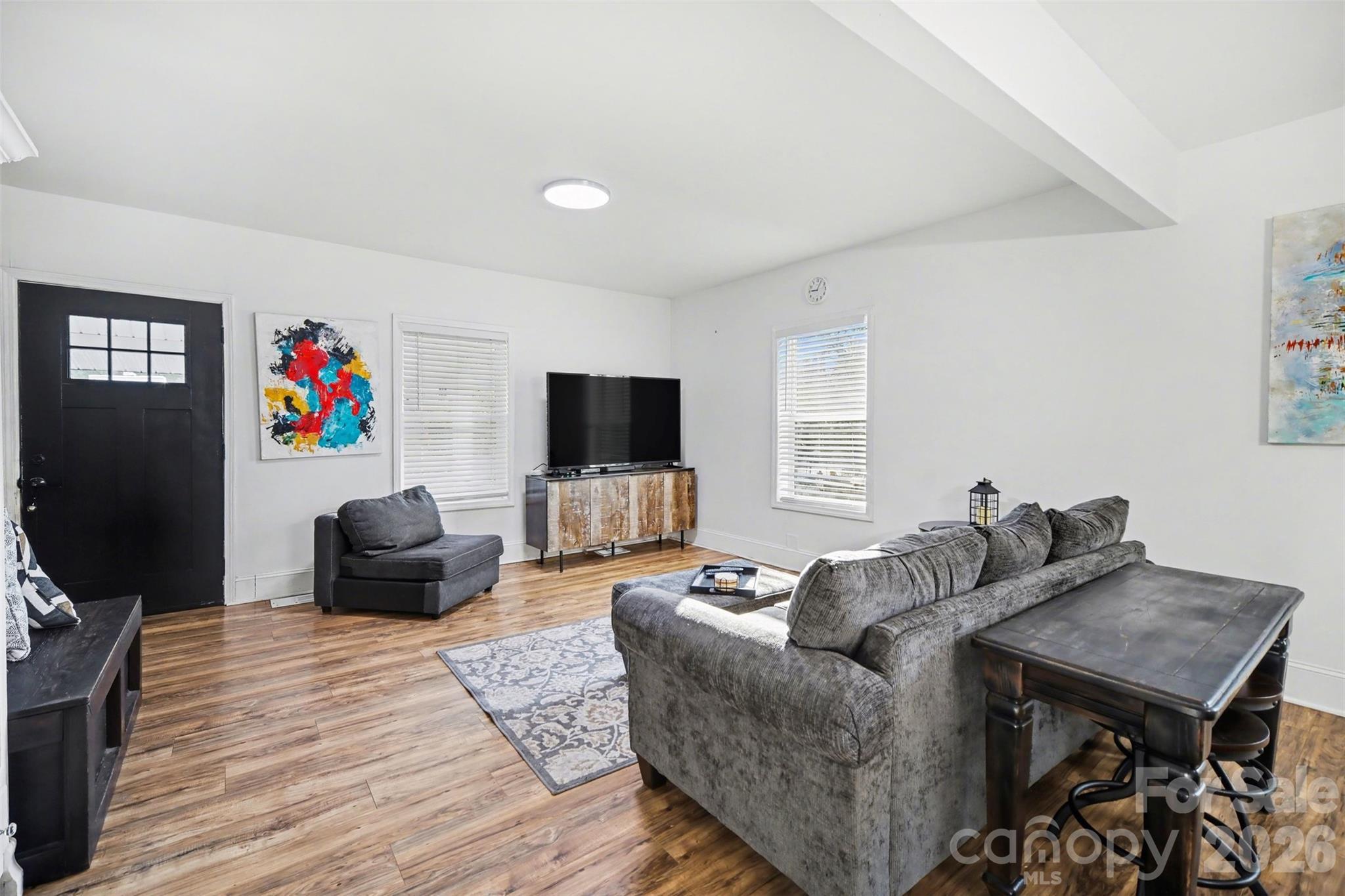 918 8th Street Lancaster, SC 29720 - Photo 2 of 32 a living room with furniture and a flat screen tv