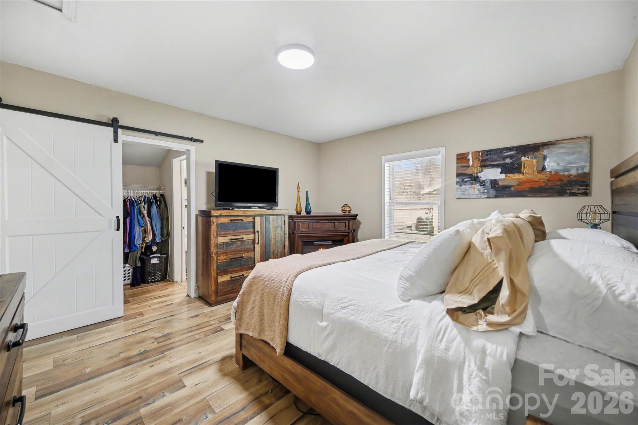 918 8th Street Lancaster, SC 29720 - Photo 22 of 32 a bed room with a bed and a television