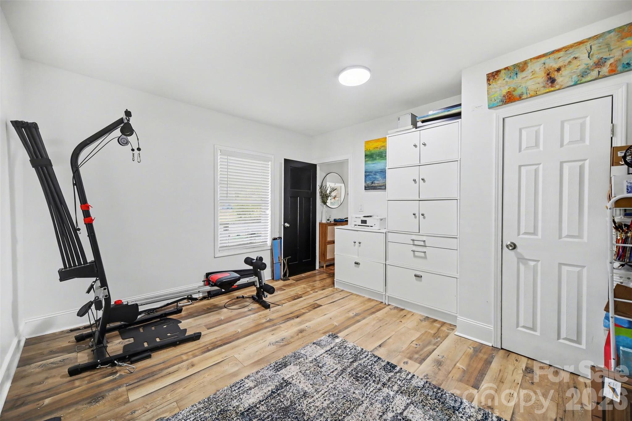 918 8th Street Lancaster, SC 29720 - Photo 27 of 32 a view of a bedroom with gym equipment