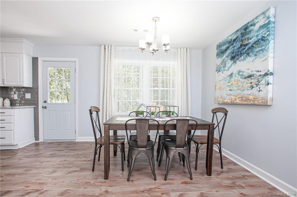 3607 Round Oak Road Charlotte, NC 28210 - Photo 21 of 36 a view of a dining room with furniture window and outside view