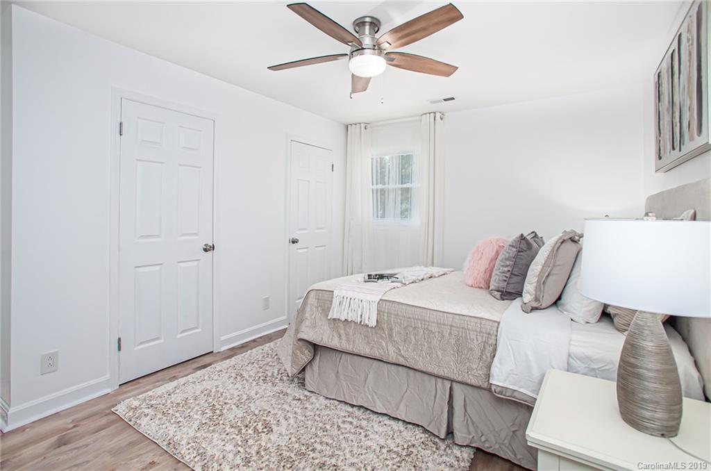 3607 Round Oak Road Charlotte, NC 28210 - Photo 25 of 36 a bedroom with a bed and a window