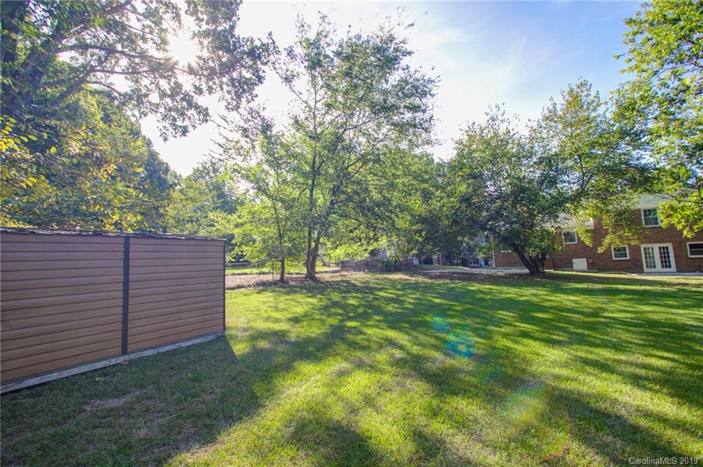 3607 Round Oak Road Charlotte, NC 28210 - Photo 9 of 36 a view of a backyard with tree s
