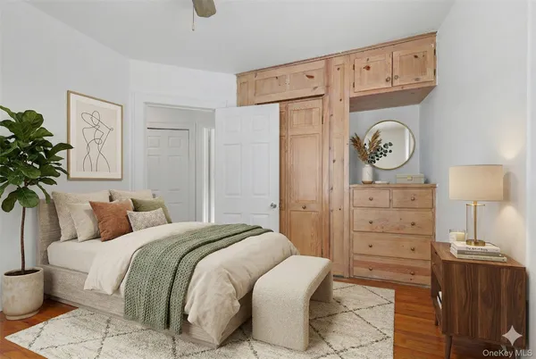 a bedroom with a bed and a closet