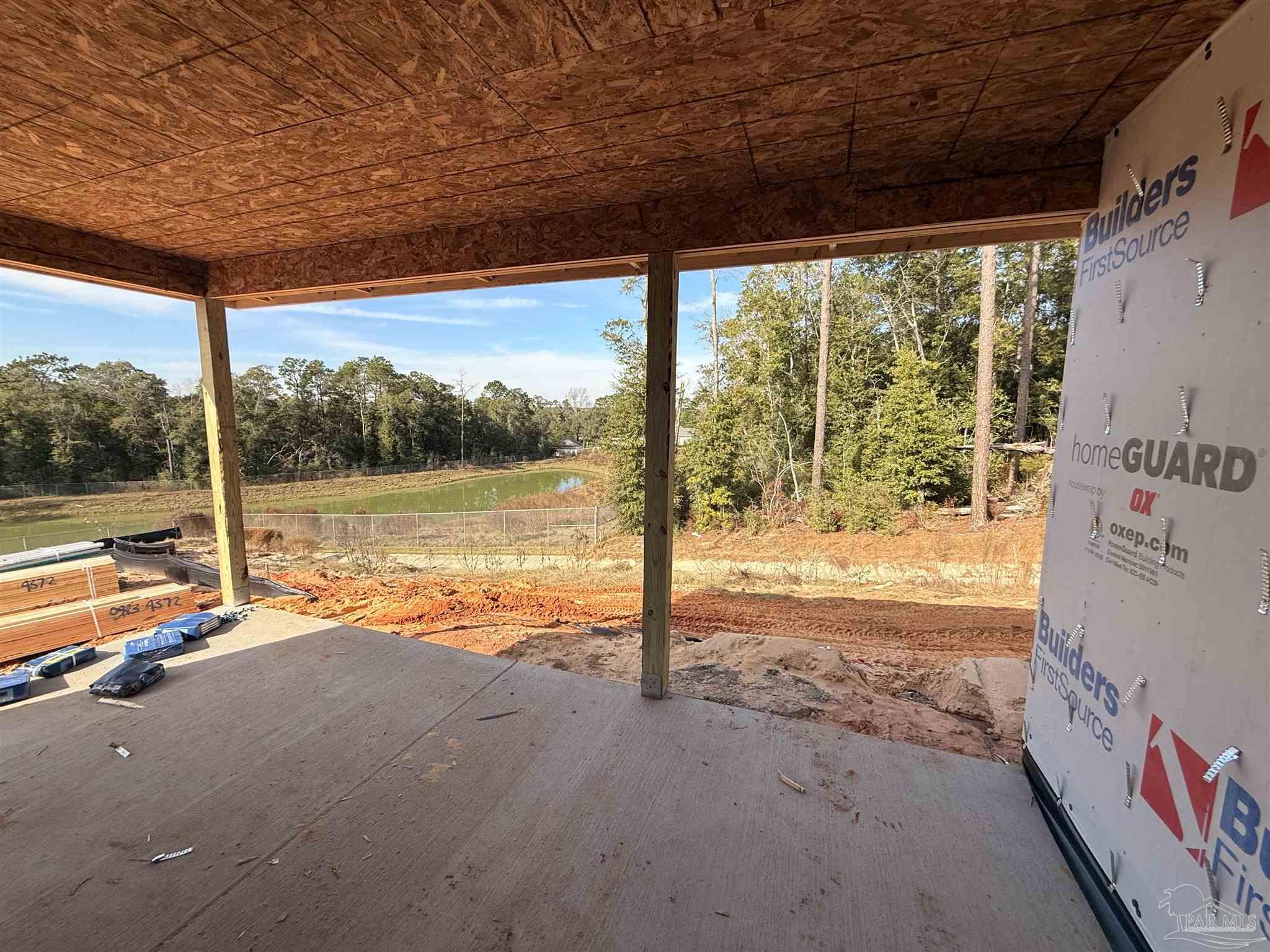 7727 Piper Circle Milton, FL 32583 - Photo 14 of 20 a view of a room with an ocean beach