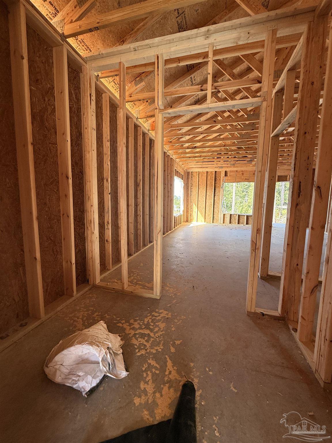 7727 Piper Circle Milton, FL 32583 - Photo 6 of 20 a view of a room with wooden floor and a window
