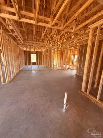 a view of empty room with windows