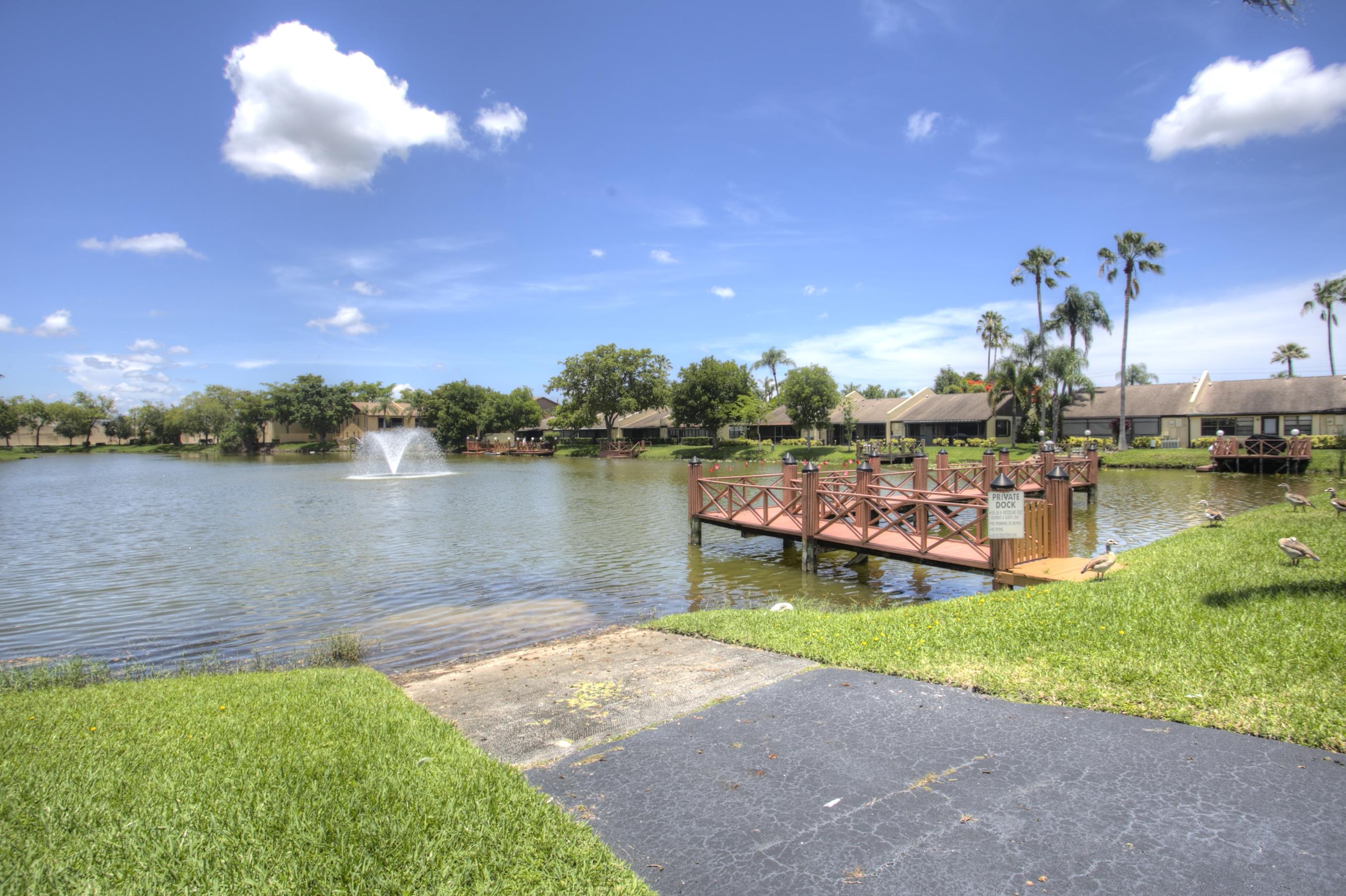 669 Banks Road Margate, FL 33063 - Photo 32 of 32 Dock at Woodlake Isles