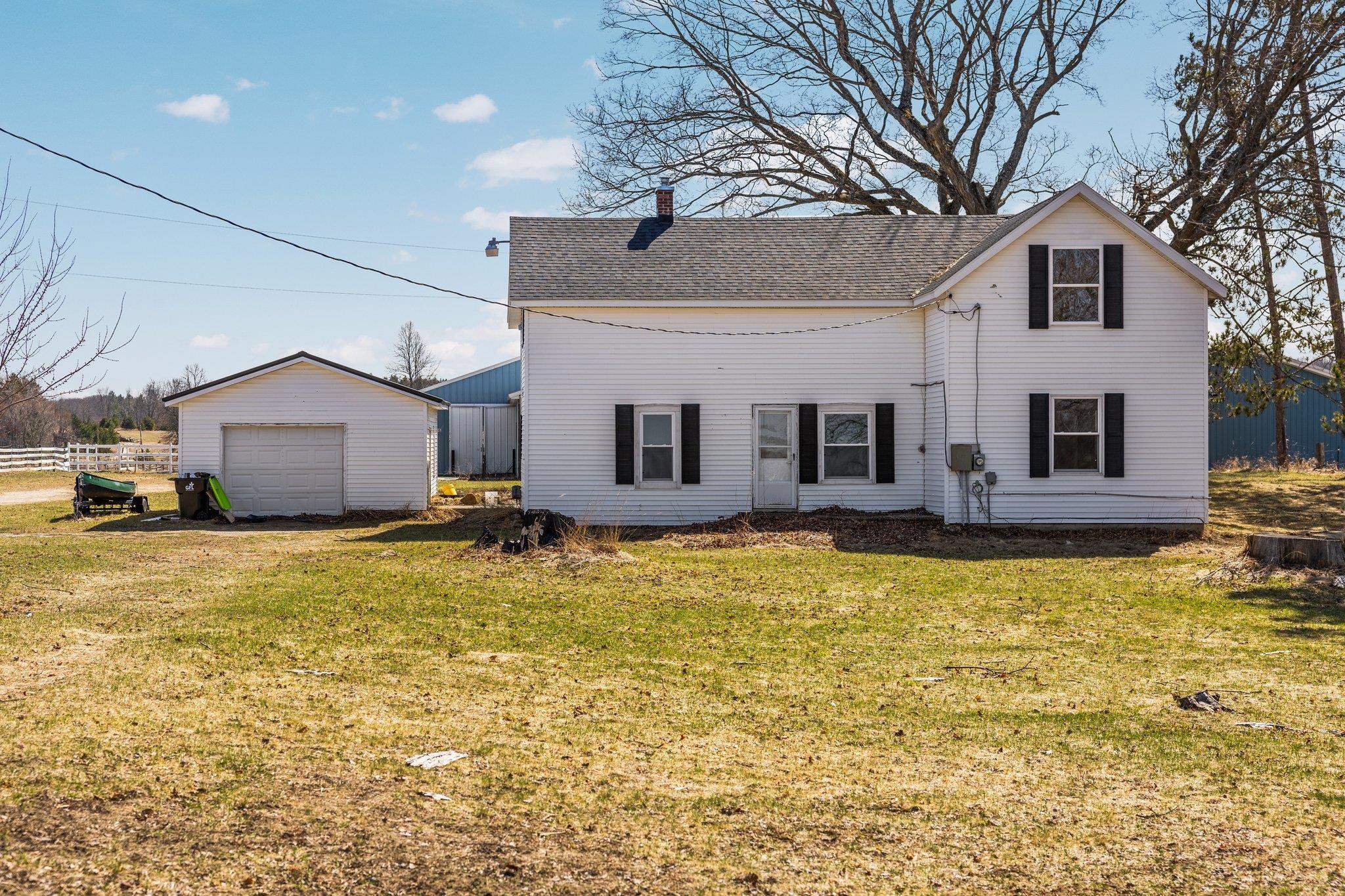 6129 Woodman Road South Boardman, MI 49680 - Photo 1 of 35 1935523-1CA7CF6F-BAE3-4CDF-B2AF-353873275F4A.JPG