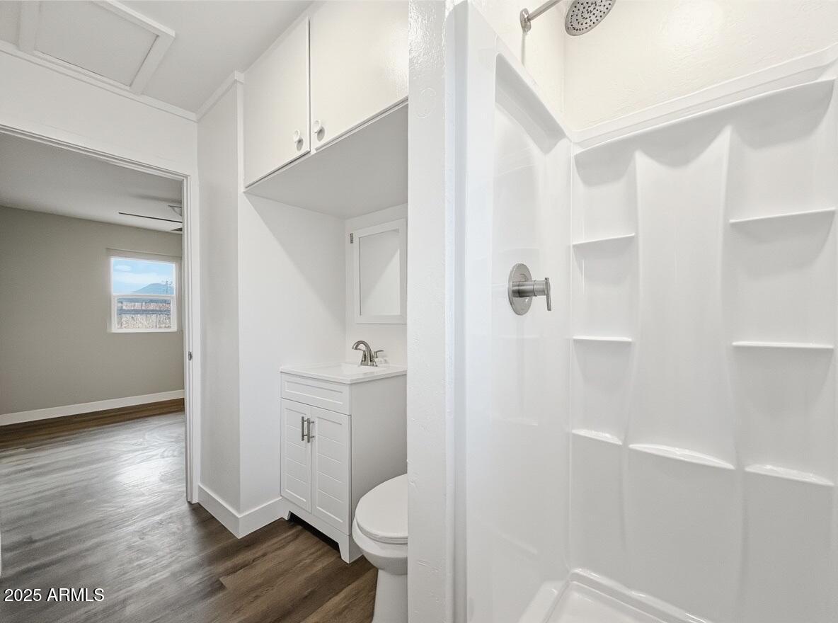 513 East Hatcher Road, Unit 6 Phoenix, AZ 85020 - Photo 4 of 8 a bathroom with a sink and toilet