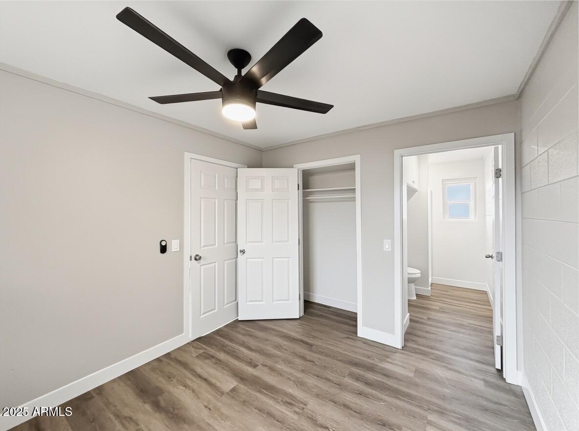 513 East Hatcher Road, Unit 6 Phoenix, AZ 85020 - Photo 5 of 8 wooden floor in an empty room