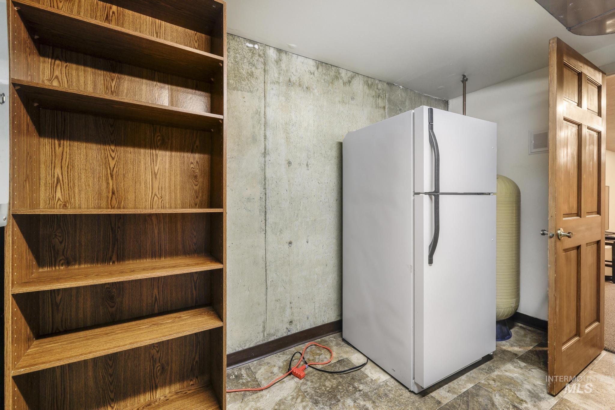 1172 Hankins Road North Twin Falls, ID 83301 - Photo 45 of 49 Kitchen featuring freestanding refrigerator
