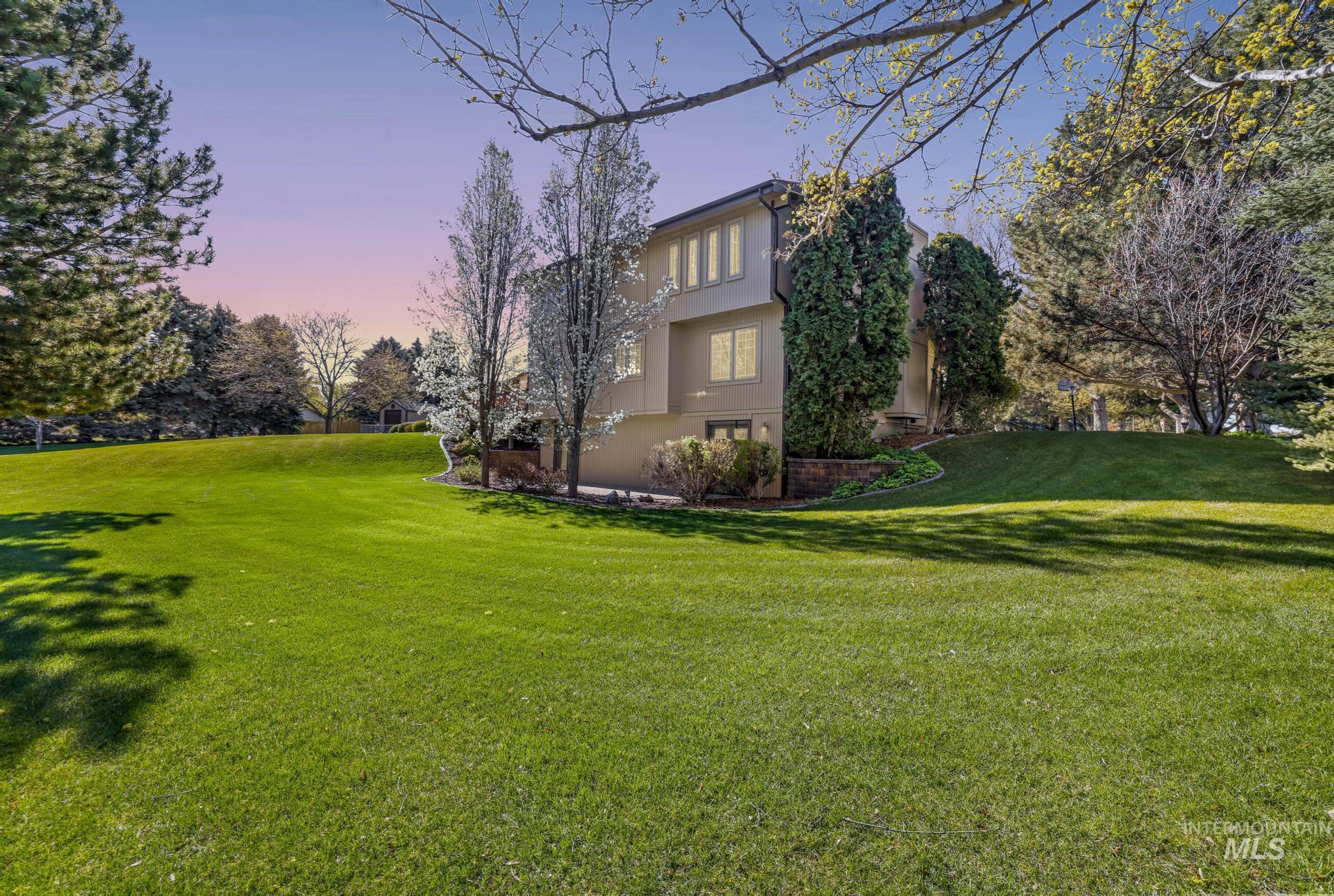 1172 Hankins Road North Twin Falls, ID 83301 - Photo 10 of 49 Yard at dusk featuring a yard