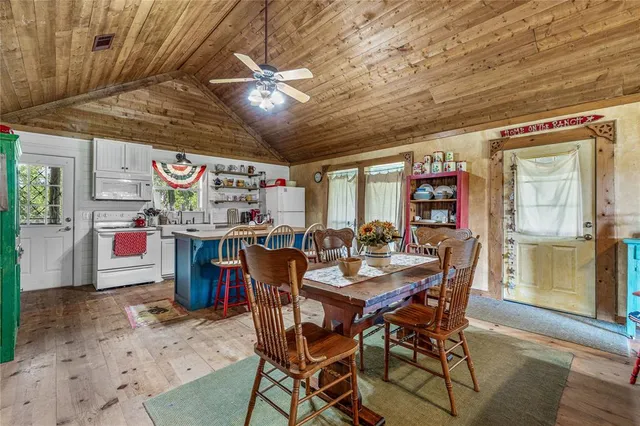 a view of a dining room with furniture