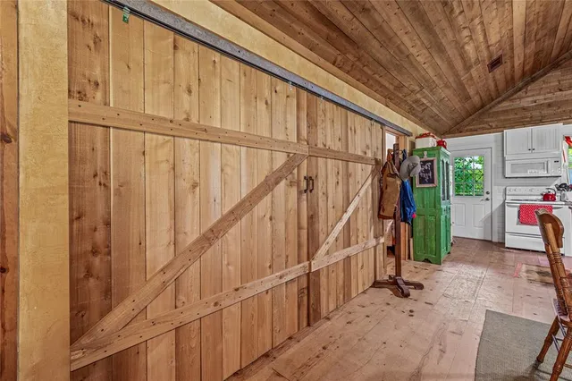 a view of a lake with a yard