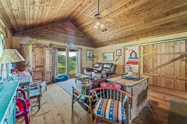 a view of a livingroom with furniture