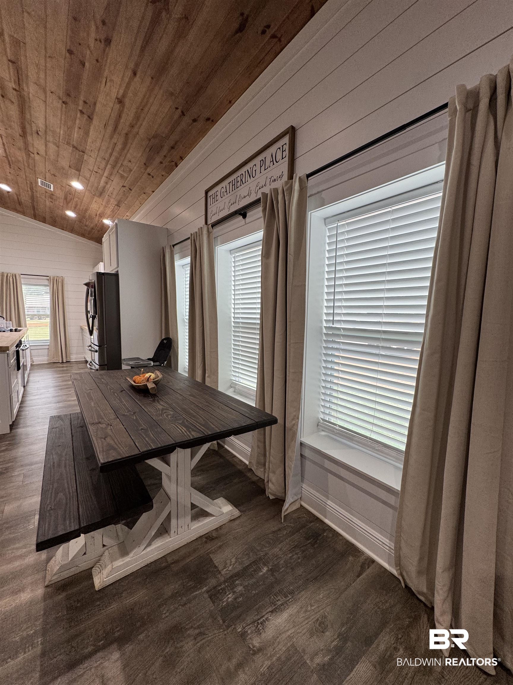 370 Dianne Road Frisco City, AL 36445 - Photo 19 of 41 Unfurnished dining area featuring wooden ceiling, dark hardwood / wood-style floors, and vaulted ceiling