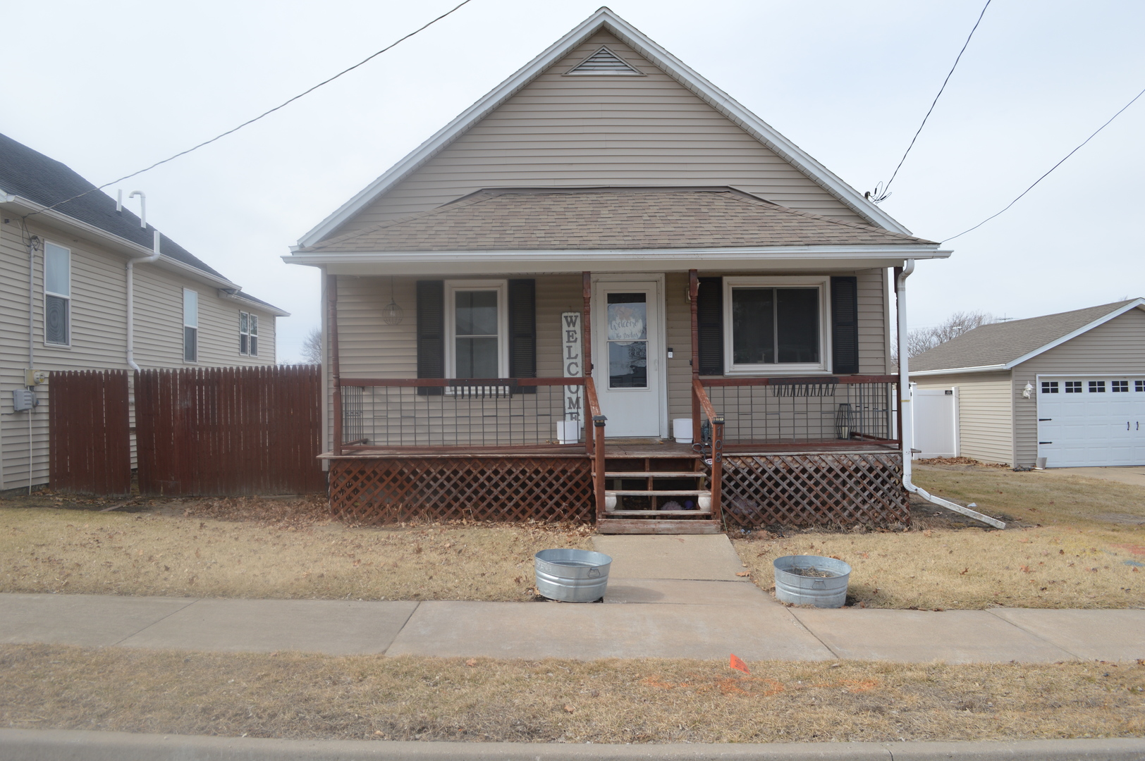 a front view of a house with garage