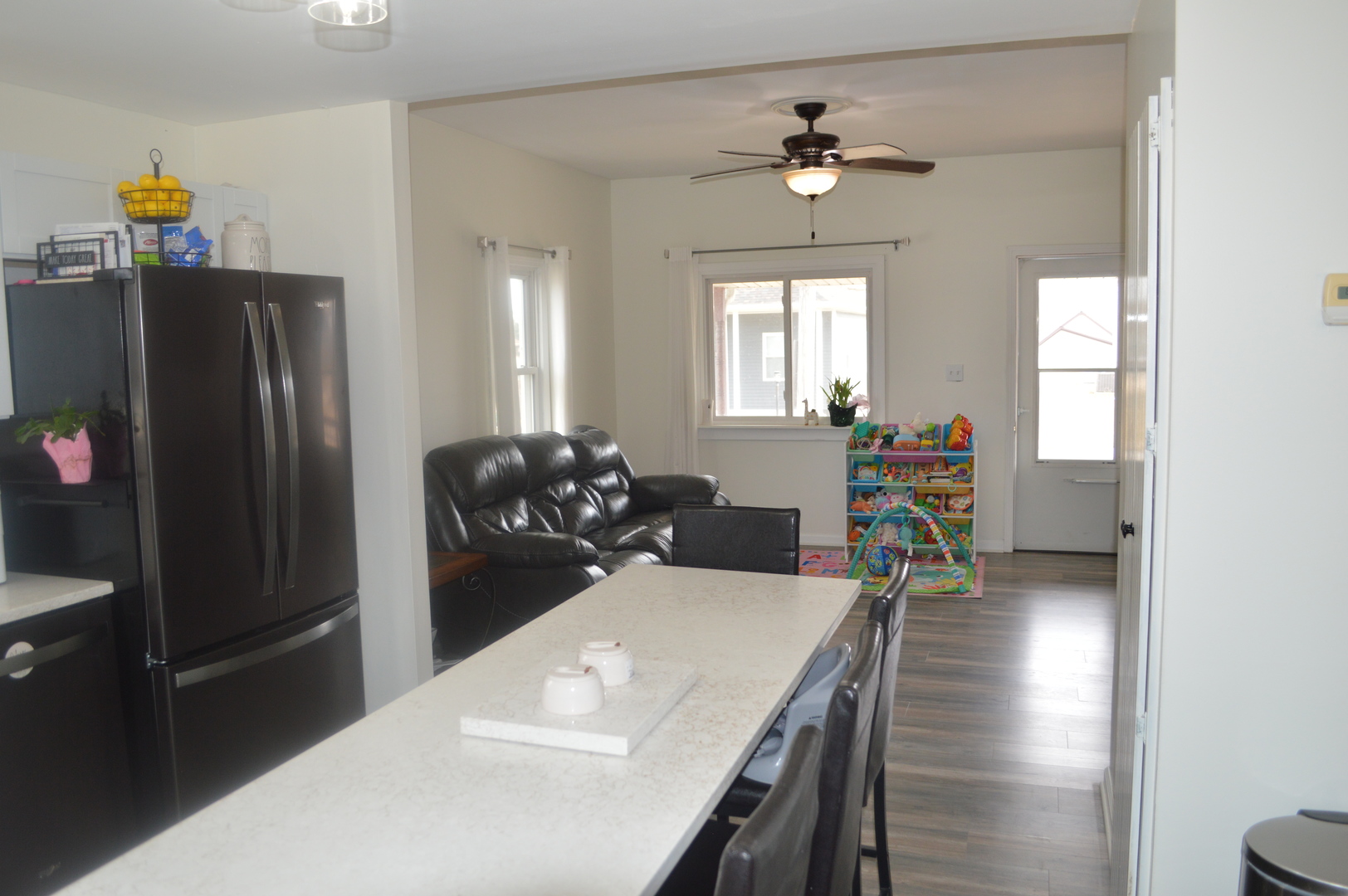 108 North Milwaukee Street Mark, IL 61340 - Photo 12 of 29 a view of a dining room with furniture window and wooden floor