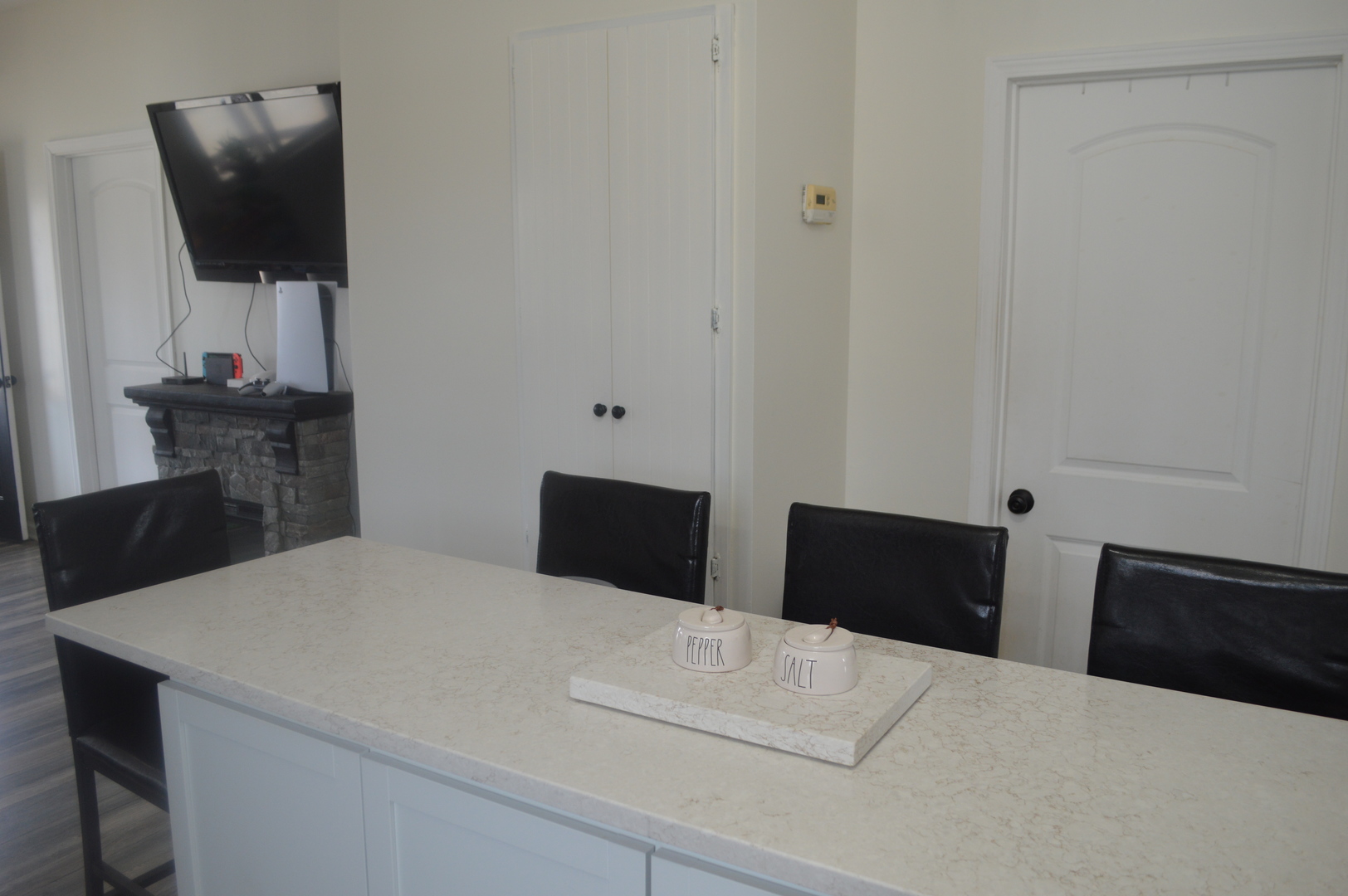 108 North Milwaukee Street Mark, IL 61340 - Photo 15 of 29 a bedroom with a bed and a flat screen tv