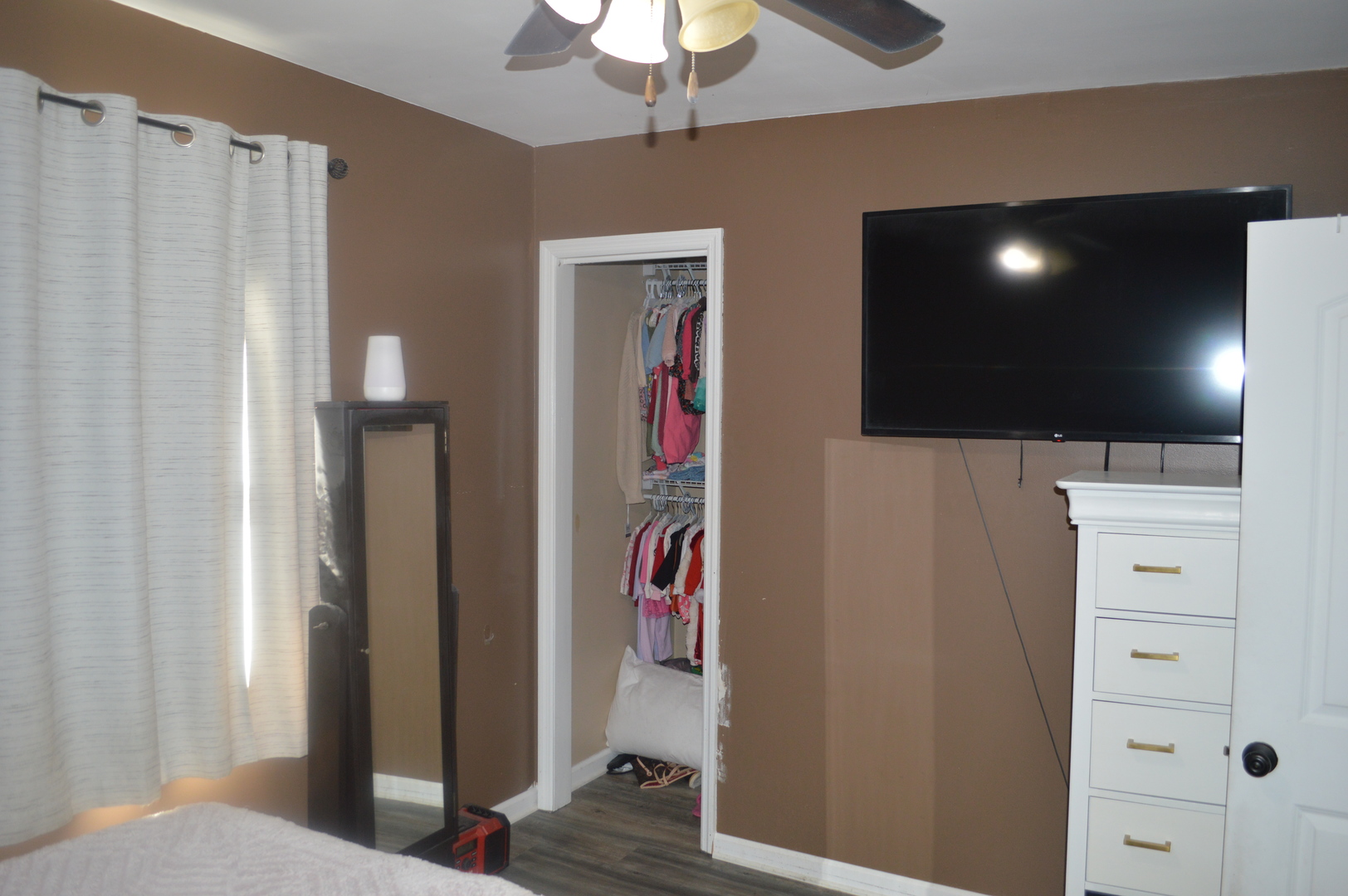 108 North Milwaukee Street Mark, IL 61340 - Photo 17 of 29 a very nice looking room with a large tree and wooden floor