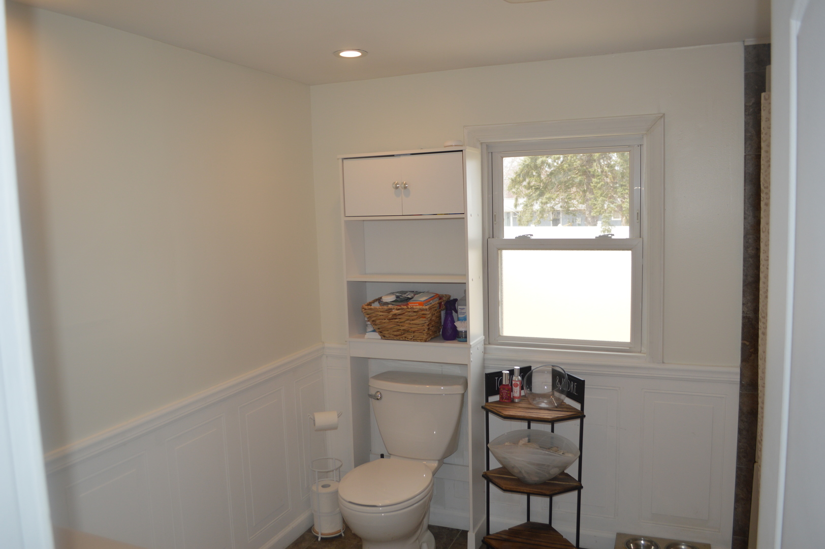 108 North Milwaukee Street Mark, IL 61340 - Photo 18 of 29 a white toilet sitting next to a bathroom sink
