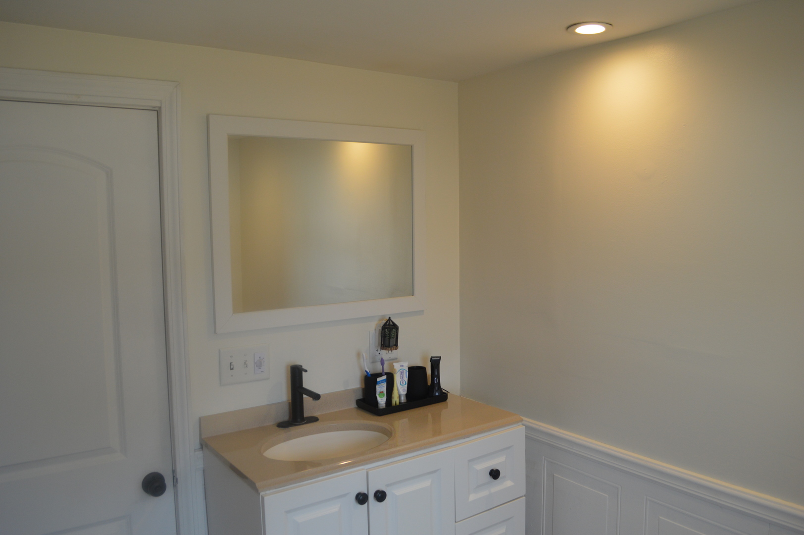 108 North Milwaukee Street Mark, IL 61340 - Photo 20 of 29 a bathroom with a sink and a mirror