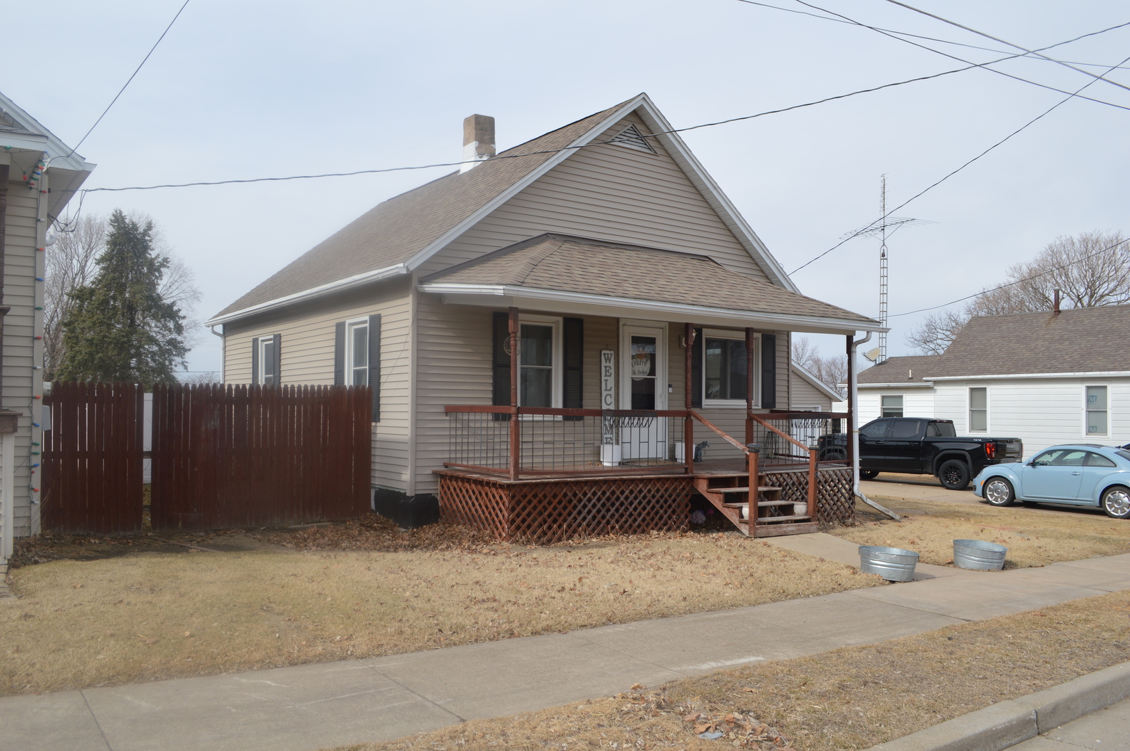 108 North Milwaukee Street Mark, IL 61340 - Photo 2 of 29 a front view of a house with a yard and parking space